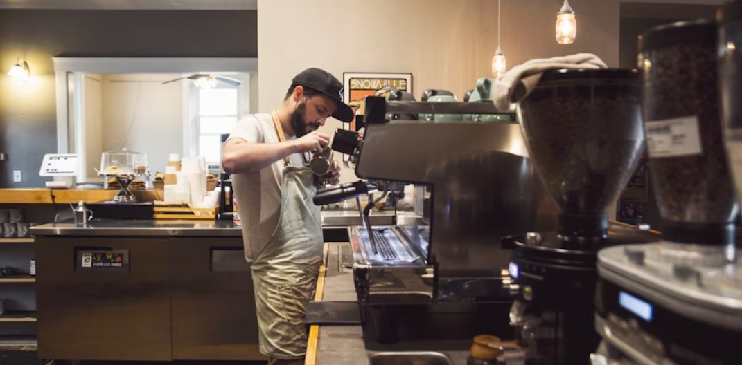 Barista making coffee